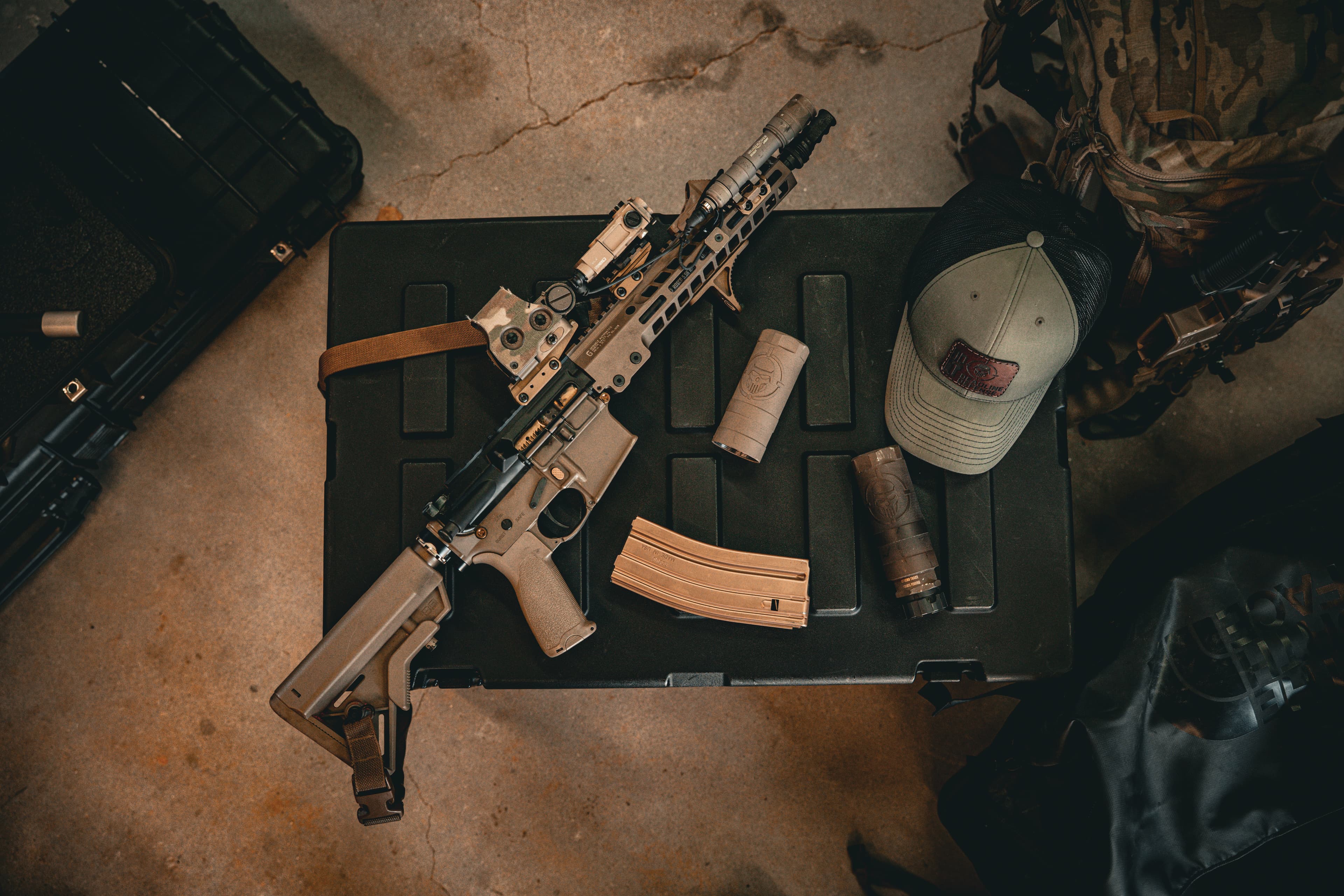 Paul’s custom 10.3" M4 platform laid out with optic and suppressor